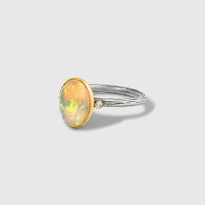 24kt Gold and Silver Oval, Opal Ring with Side Diamonds by Prehistoric Works of Istanbul, Turkey.