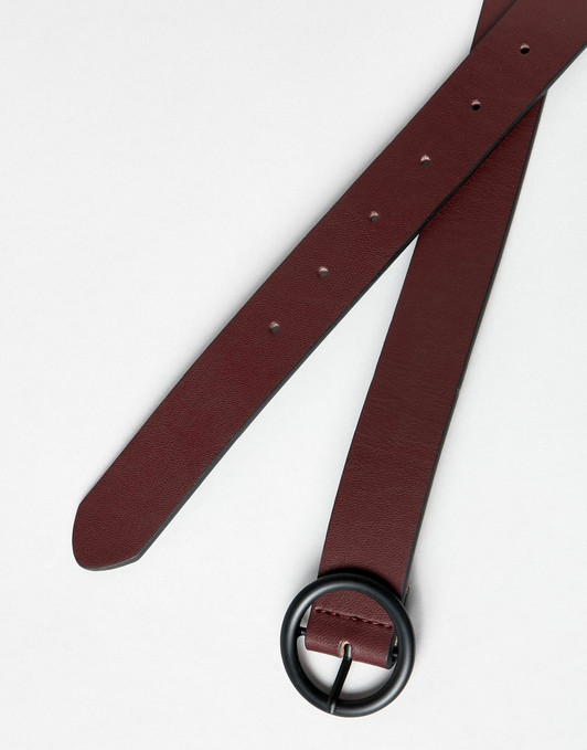 Faux leather slim belt in burgundy with matte black circle buckle