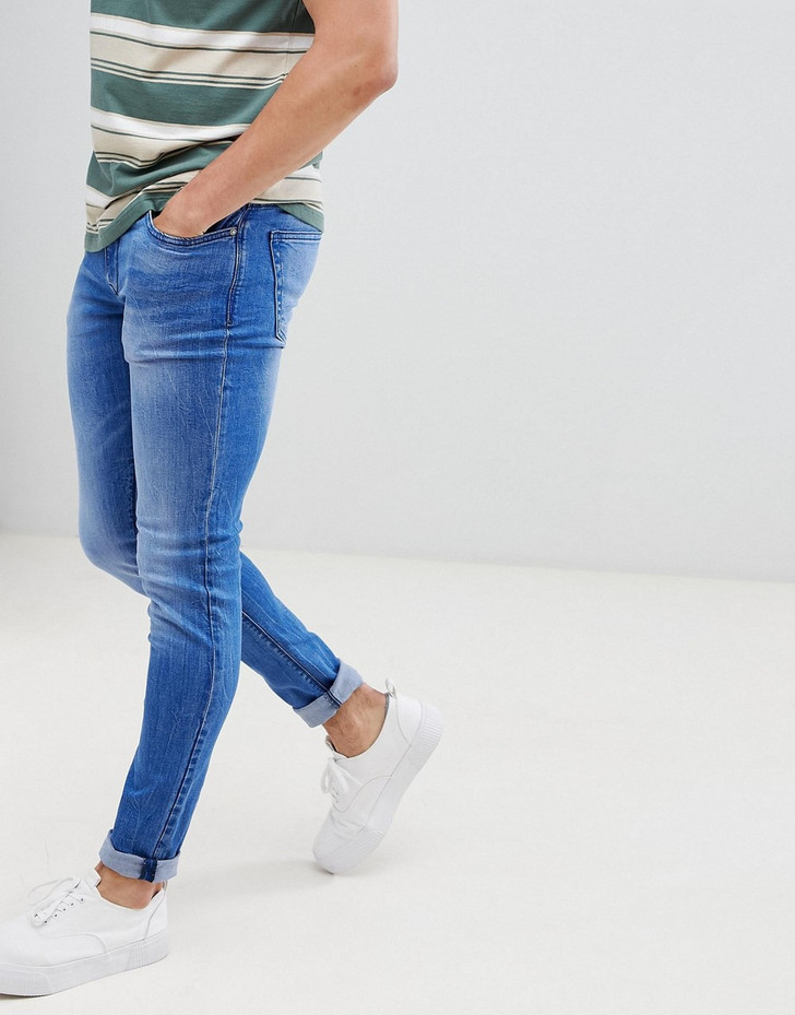 Celio Skinny Fit Jeans In Mid Blue With Raw Hem Edges