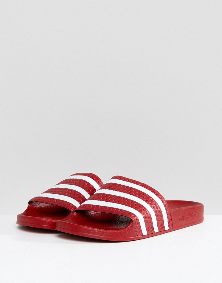 adidas Originals Adilette sliders in red 288193