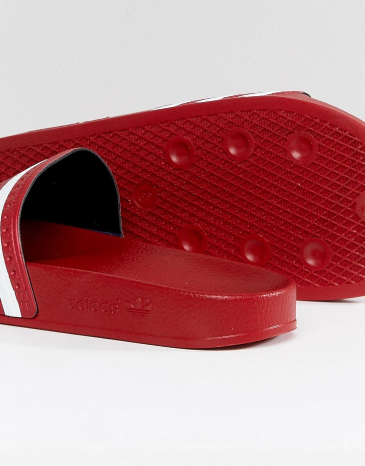 adidas Originals Adilette sliders in red 288193