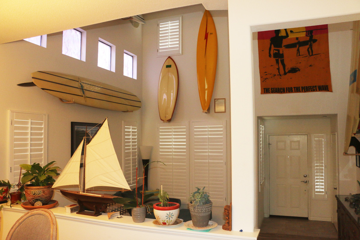 Handmade surfboard paddle board wall racks by Hawaiian Gun Rack