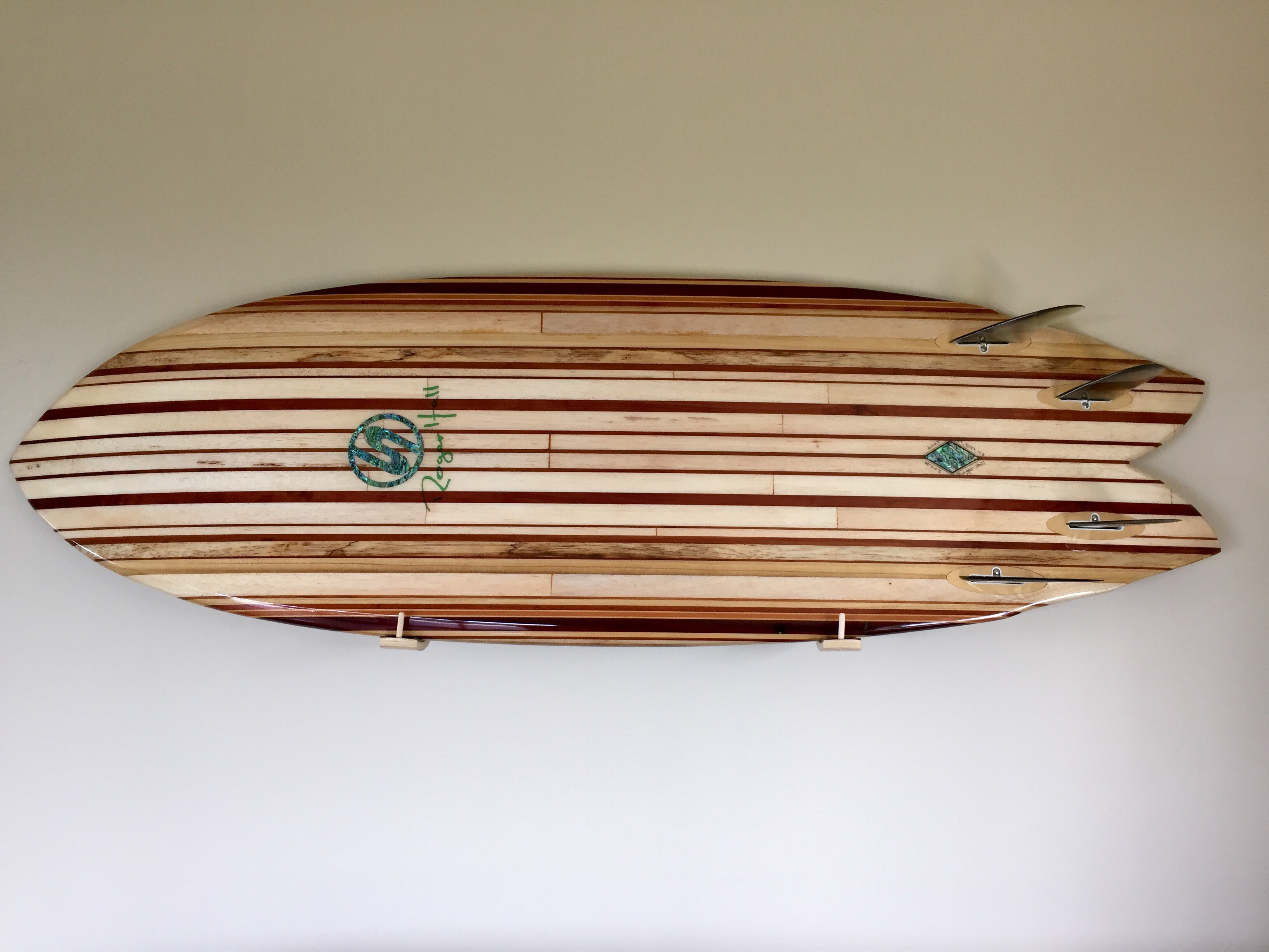 Handmade surfboard paddle board wall racks by Hawaiian Gun Rack