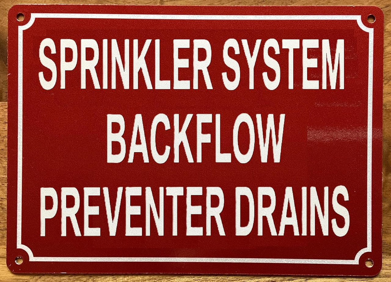 Sprinkler system backflow preventer drains sign (Red Backround ...