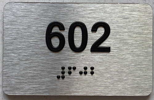 ADA APARTMENT NUMBER 602 SIGN