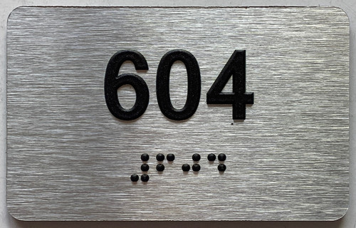 ADA APARTMENT NUMBER 604 SIGN