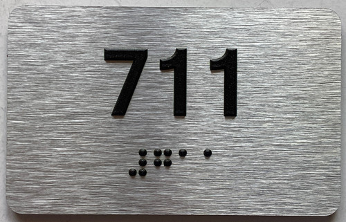 ADA APARTMENT NUMBER 711 SIGN