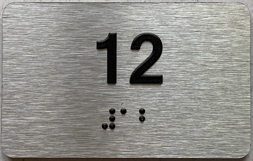 ADA APARTMENT NUMBER 12 SIGN
