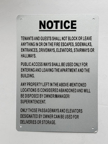 NO STORAGE IN HALLWAY Sign