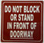 Do not block or stand in front of doorway HPD SIGN