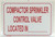 COMPACTOR SPRINKLER CONTROL VALVE LOCATED IN-  Signage