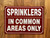 NYC SPRINKLERS IN COMMON AREAS ONLY SIGN