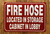 FIRE HOSE LOCATED IN STORAGE CABINET IN LOBBY SAFETY SIGN