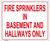 FIRE SPRINKLERS IN BASEMENT AND HALLWAYS ONLY SIGN