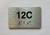 Apartment Number unit 12C Braille Sign