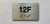 Apartment Number unit 12F Braille Sign