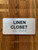 Linen Closet Sign with Raised Letters & Grade 2 Safety Sign