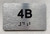 APT# 4B SILVER Braille Sign