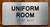 The Uniform Room Ada Sign