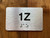 Apartment Number 1Z Compliance Sign
