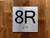 8R Elevator Jamb Plate Compliance Sign