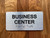 Business Center With Sign with Raised Letters Compliance Sign