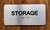Storage With Sign with Raised Letters Ada Sign