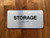 Storage With Sign with Raised Letters Compliance Sign
