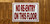 white-no-re-entry-on-this-floor-screw-mount-sign.jpg