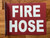 fire-hose-3d-projection-hallway-7x10-building-signage.jpg