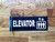 elevator-hallway-black-safety-sign.jpg