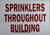 SPRINKLERS Throughout Building Sign