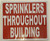 SPRINKLERS Throughout Building   Sign