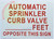 AUTOMATIC SPRINKLER CURB VALVE FEET OPPOSITE THIS  Sign