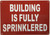 Building is fully sprinkler   Signage