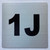 Apartment number 1J sign
