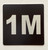Apartment number 1M sign