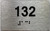 BRAILLE APARTMENT NUMBER 132 SIGN