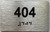 HOTEL DIRECTIONAL SIGN APARTMENT NUMBER 404