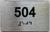 HOTEL ADA APARTMENT NUMBER 504 SIGN