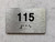 Signage Apartment number  - Unit number  / Suite number  comes with Raised letters & Grade 2 Braille - Includes Red Adhesive pad for Easy Installation - The park Ave Line (Apt 115)