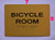 BRAILLE BICYCLE ROOM SIGN