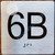 BRAILLE APARTMENT NUMBER 6B SIGN