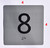 BRAILLE ELEVATOR JAMB PLATE WITH BRAILLE (8TH FLOOR) SIGN
