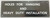 IN EMERGENCY PUSH BAR TO OPEN BUILDING SIGN
