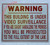 WARNING THIS BUILDING IS UNDER VIDEO SURVEILLANCE SIGN