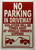 No parking in driveway with image DOB SIGN