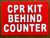 CPR KIT BEHIND COUNTER BUILDING SIGN