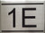 APARTMENT NUMBER SIGN -1E -BRUSHED ALUMINUM