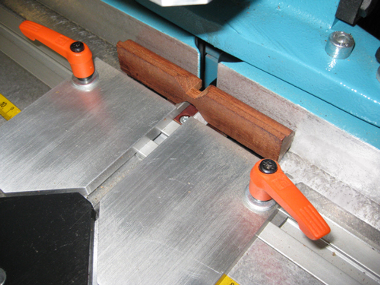 Hoffmann half-lap joint fixtures on Hoffmann X-20 routing machine, face side cut